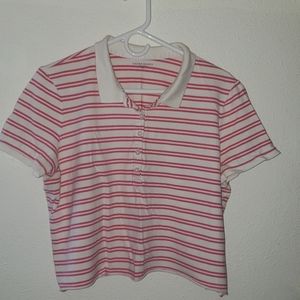 A pink and white striped collared shirt